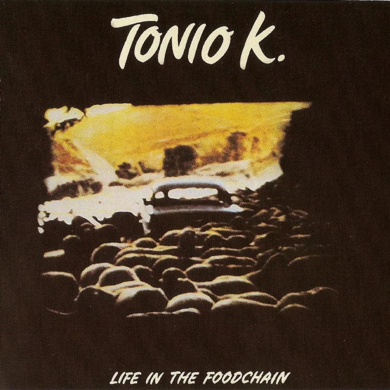 Tonio K.  Life In The Foodchain Label Epic  EPC 83607 Format Vinyl, LP, Album Country Europe Released1979 Genre Rock Style Alternative Rock, New Wave